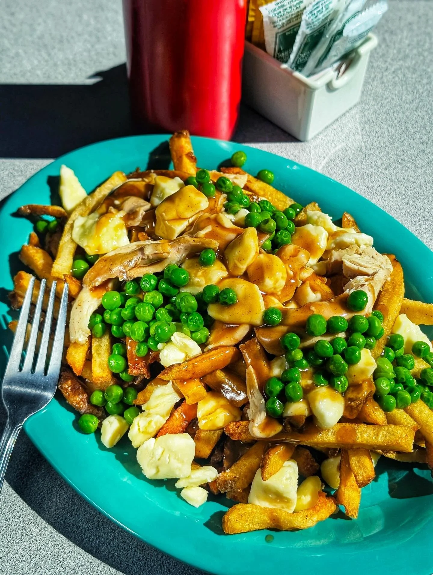 APRIL 11th IS NATIONAL POUTINE DAY! 

TO CELEBRATE, HERE IS A QUEBEC CLASSIC &amp; JENNA&rsquo;S FAV POUTINE EVER:

LA POUTINE GALVAUDE 

🍟 FRIES 
🧀 QUEBEC CURDS
🍗 PULLED CHKN
🦴 LA SAUCE BRUNE 
🫛GREEN PEAS 

AVAIL: APR 10-12