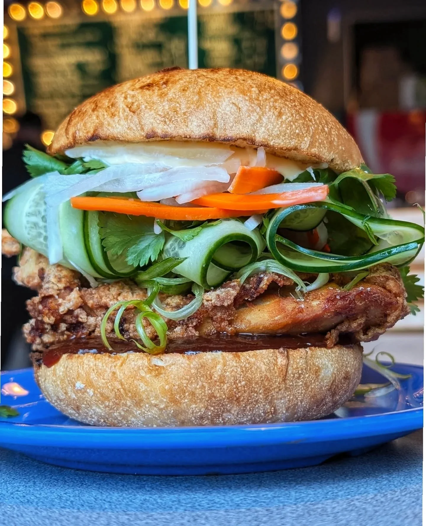 1.THE BANH MI

FRIED CHKN 🐔
HOISIN BBQ SAUCE (contains gluten &amp; soy)
PICKLED CARROT &amp; DAIKON 🥕
GREEN ONION, CILANTRO 🍀
CUCUMBER RIBBONS 🥒🎀
KEWPIE MAYO (contains gluten &amp; soy) 

2. ST. PADDY'S POUTINE 🍀

FRIES 🍟 
PULLED CHKN 🐔
CHEE