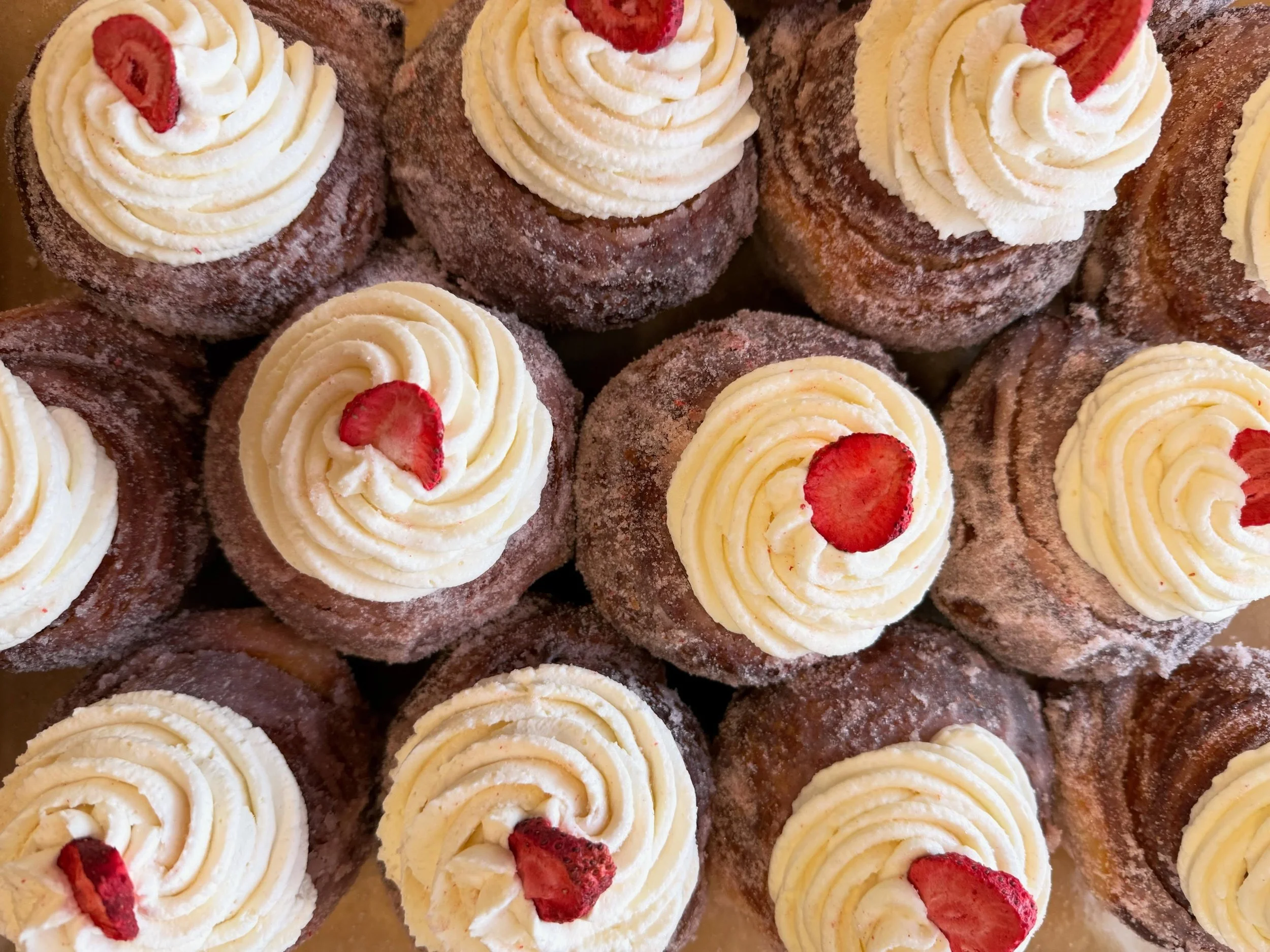 Strawberry Rhubarb &amp; Cream Cruffins!!! This is our new seasonal cruffin flavor. Croissant muffin rolled in strawberry sugar and filled with a strawberry rhubarb compote cream and topped with mascarpone whipped cream. It tastes like summer!!🍓🌞🏖
