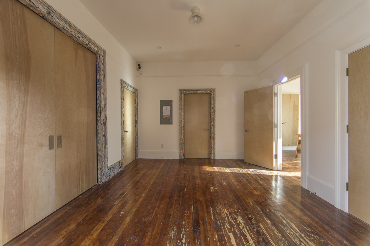 The upper floor's central entryway