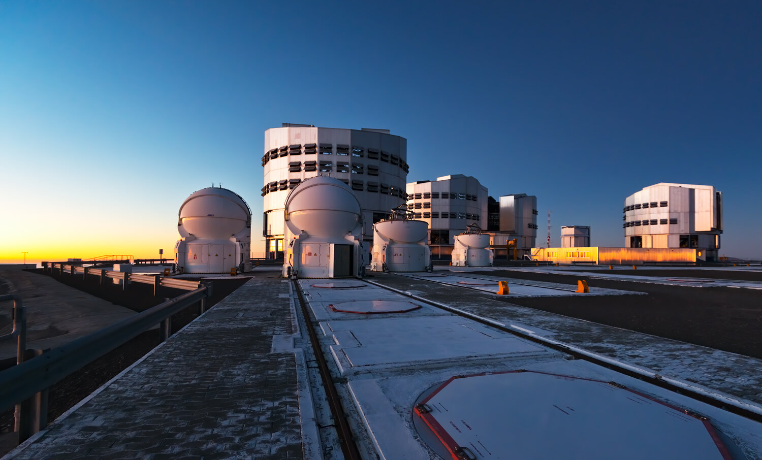 VLT ESO PARANAL (Photograph)Very Large Telescope (VLT), European Southern Observatory, Cerro Paranal, Atacama, Chile (2013). The four main Unit Telescopes from left to right are UT1 (“Antu”), UT2 (“Kueyen”), UT3 (“Melipal”), and UT4 (“Yepun”).