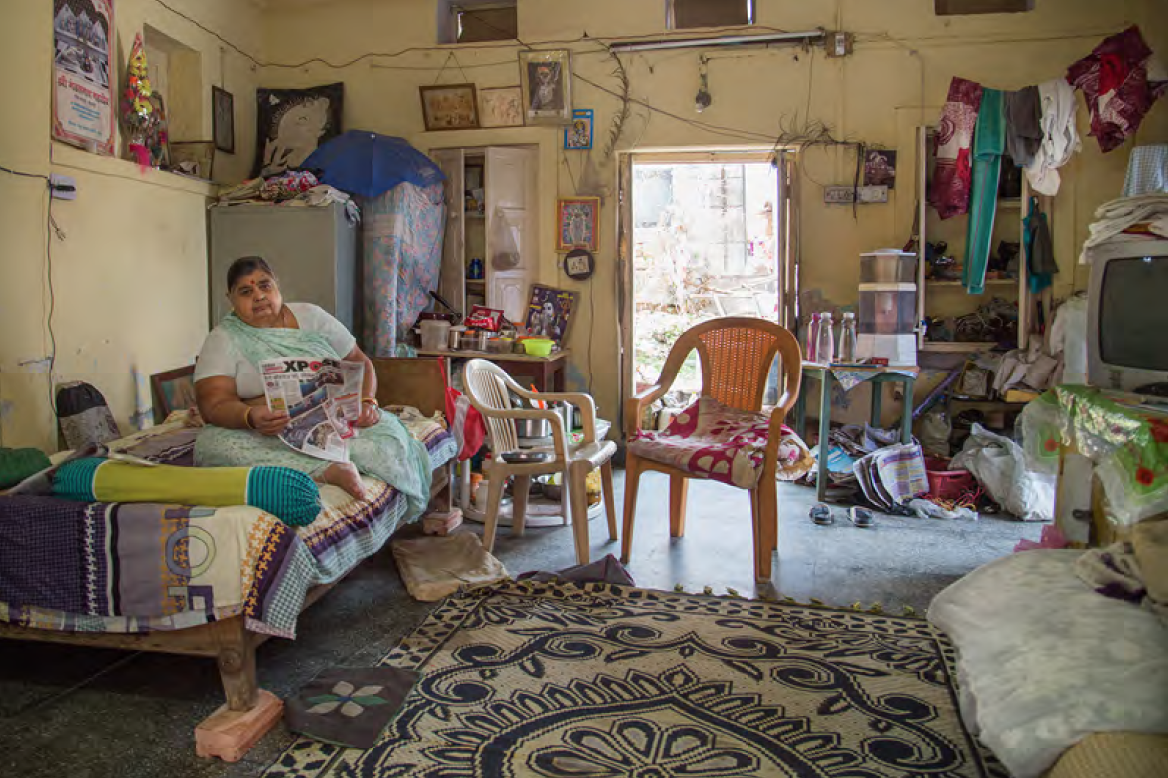 This home belongs to an old couple married for 61 years. Her husband is outside talking on the phone with his older son. They spend their daily lives together.