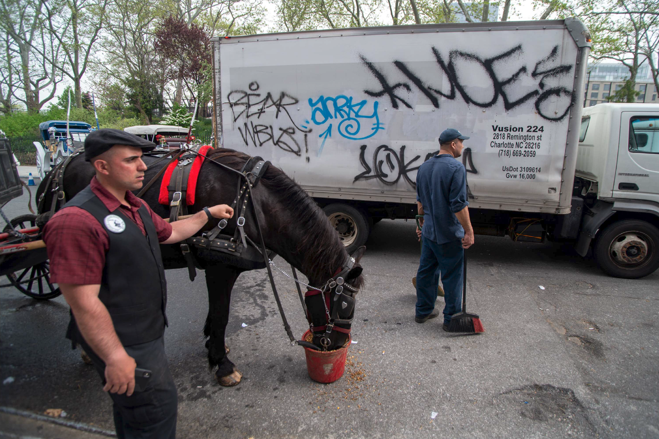  The beginning of a working day outside of Clinton Park Stable, on 52nd Street and 11th Avenue, New York, May 2019. 