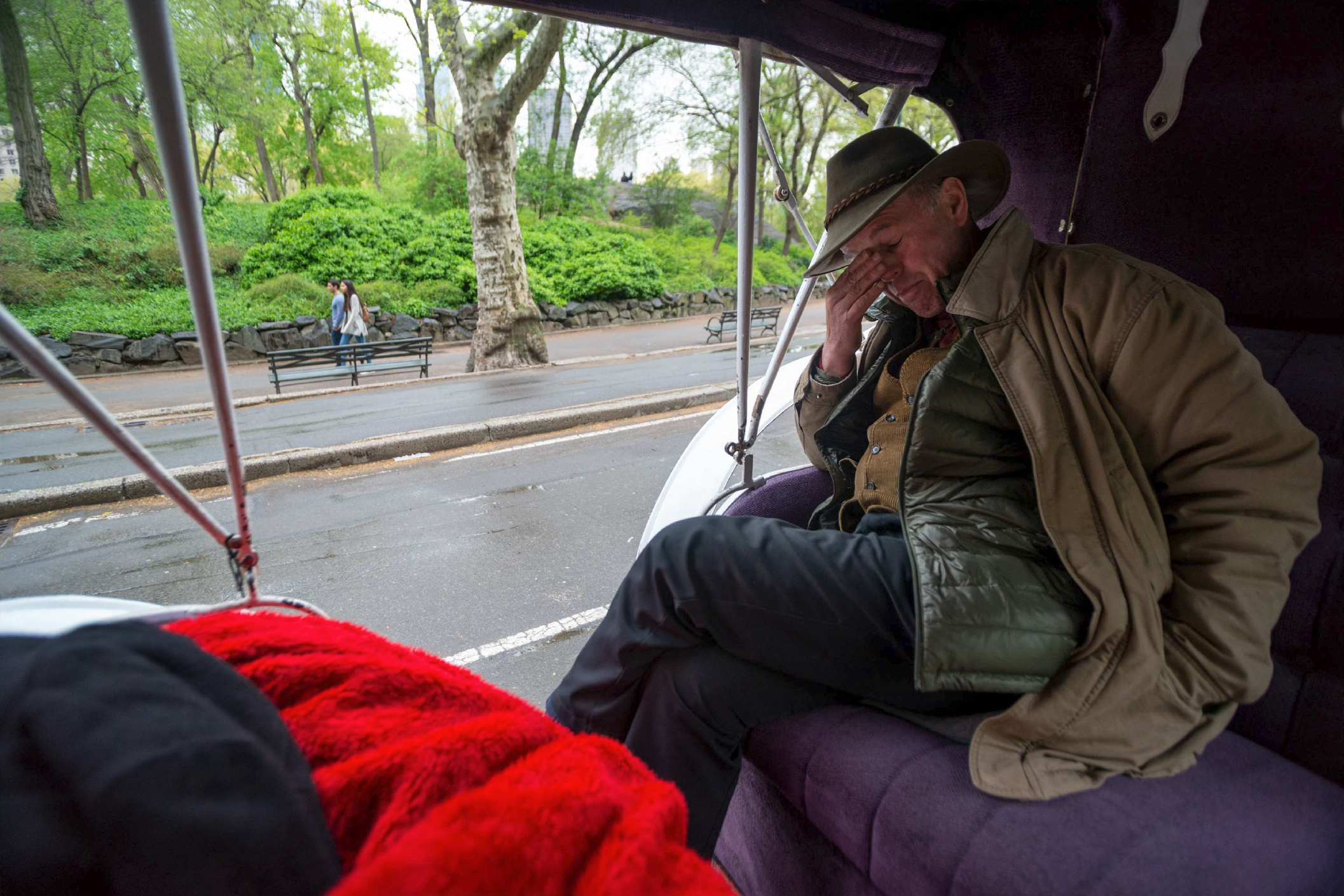  Ariel Fintzi waits for clients on the south east corner of Central Park, New York, April 2019. 