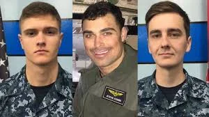 From left: Airman Matthew Chialastri; Lt. Steven Combs; and Airman Apprentice Bryan Grosso. (U.S. Navy via AFP/Getty Images)