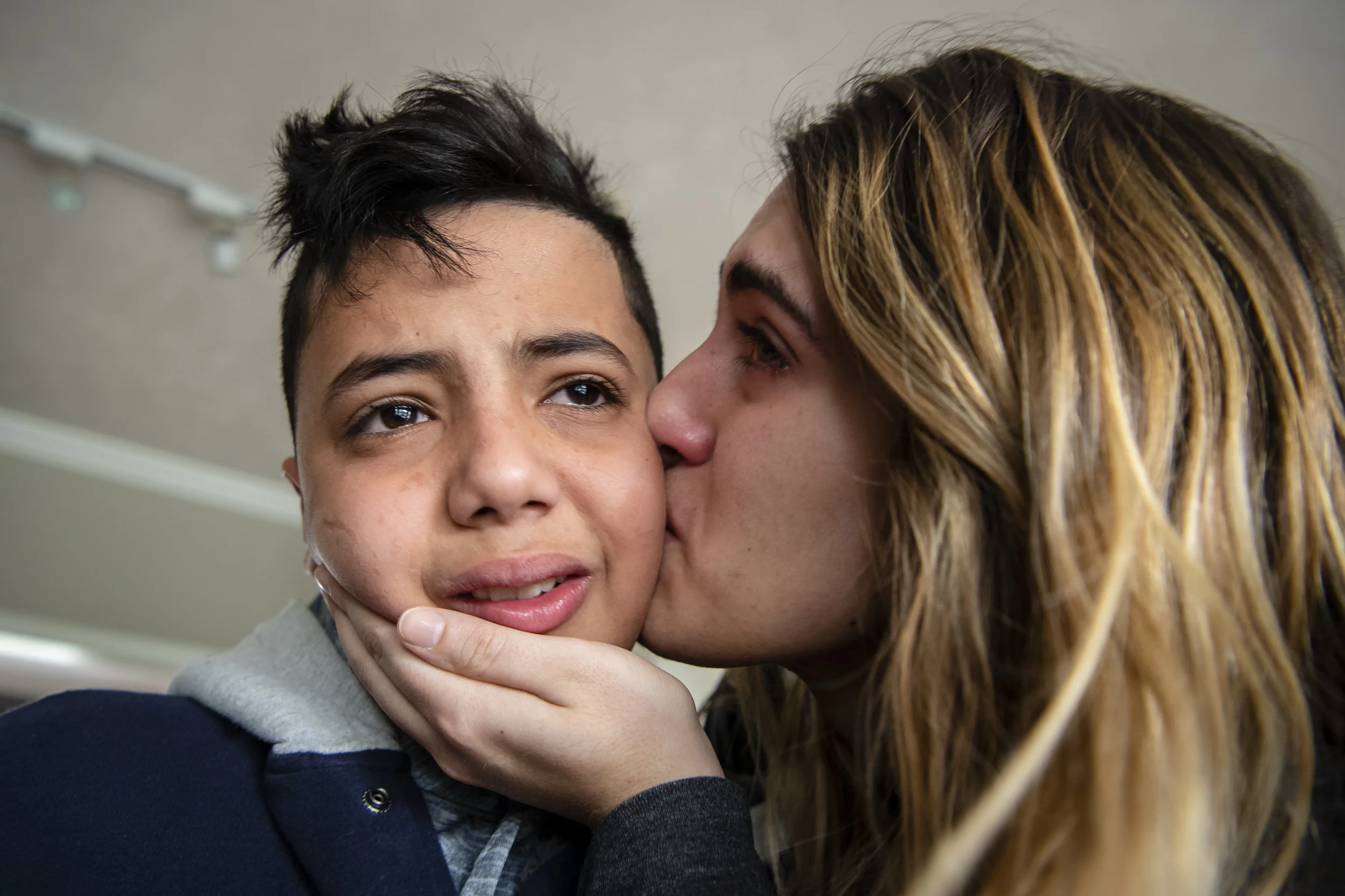 Noor Bahhur tearfully kisses Abood goodbye before her father drove him to the airport, telling him to stay in touch. For the last few weeks of his time in the United States, Abood lived with the Bahhur family, growing very close to Noor and her brother Omar. “I think he saw us as siblings,” Noor said. “For a boy who’s 11, who lost his leg, he never had a dull moment. I’ve never seen him without a smile — even though he’s thousands of miles away from his family.”
