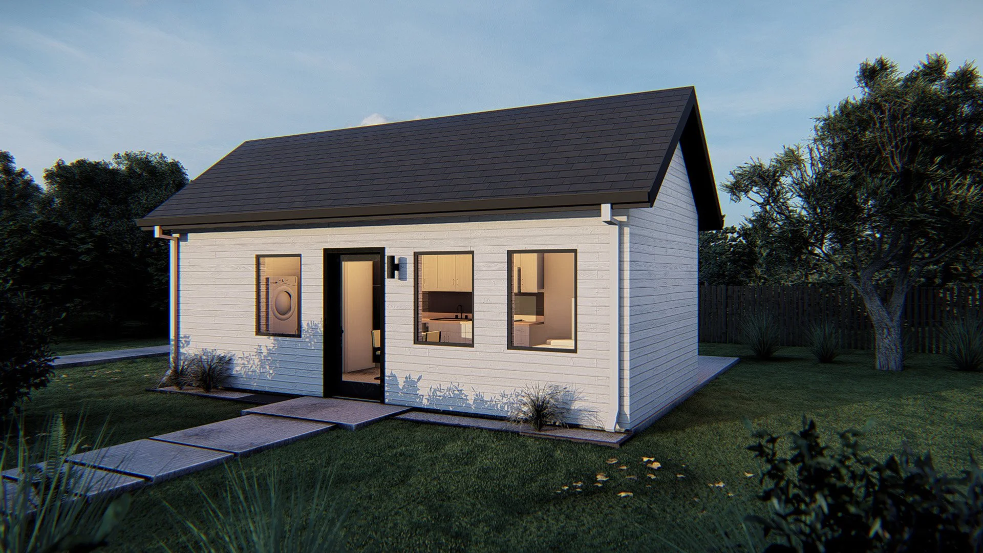 Small modern house with white siding, black roof, and large windows in a grassy yard with trees.