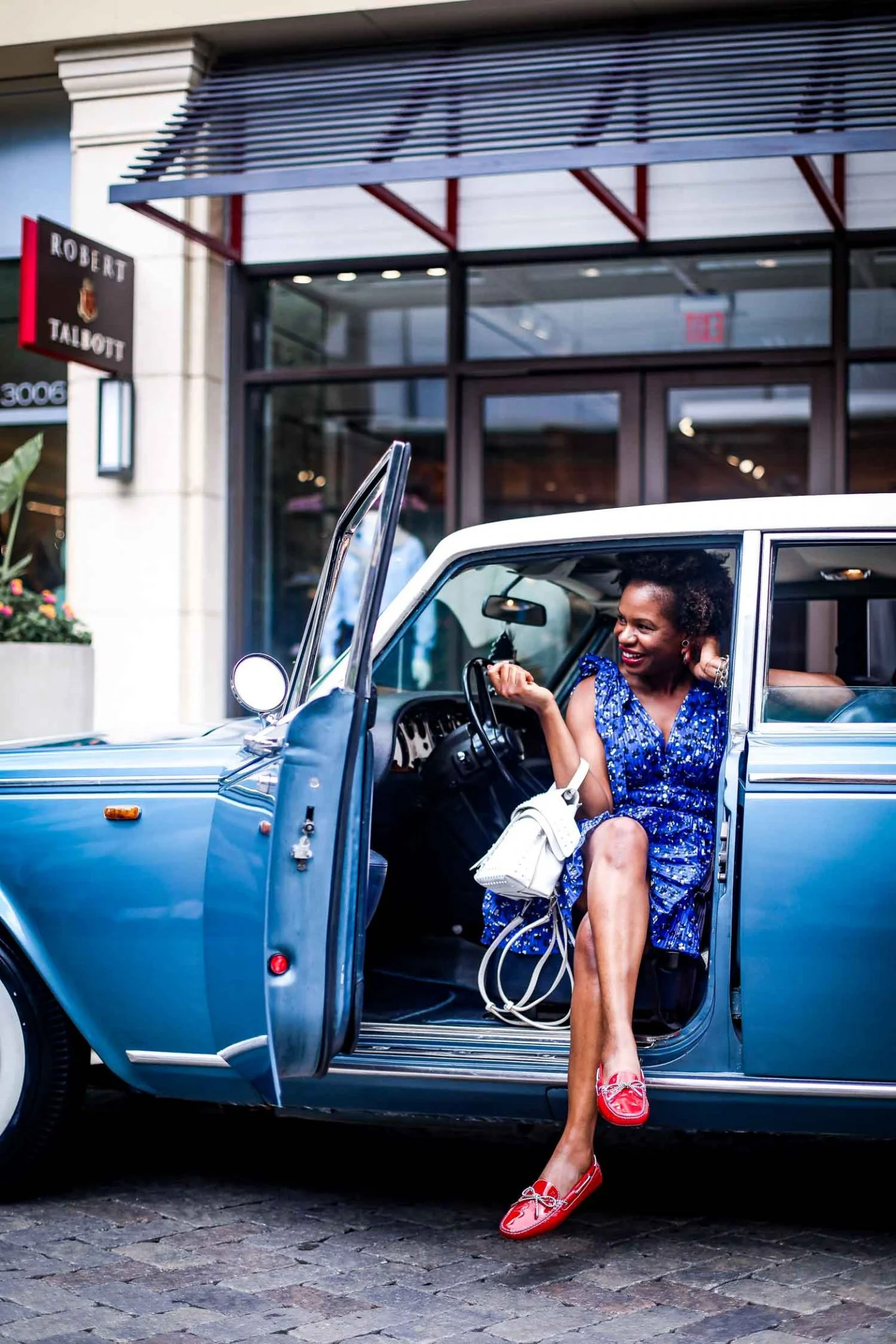 Atlanta-blogger-wearing-Tod’s-Gommino-Driving-Shoes-and-Tod-white-bag-in-a-Rolls-Royce-8-1440x2160.jpg