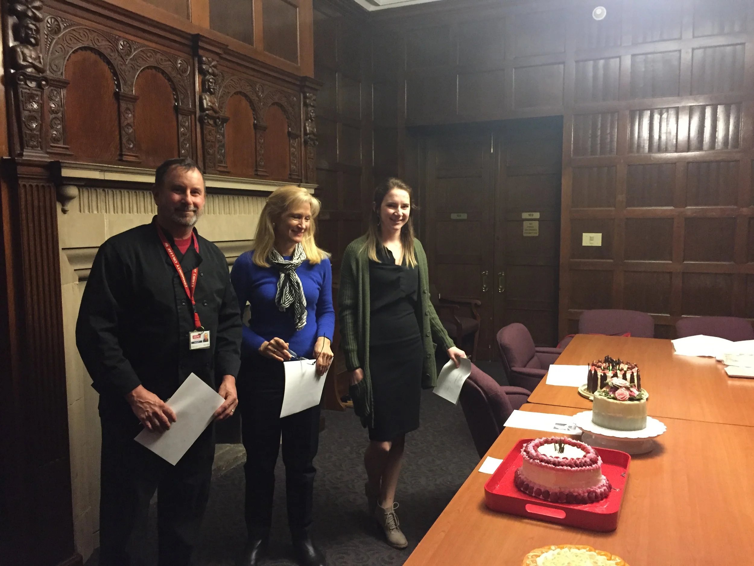 Chef Randy Herbe, Cappi Hilyard, and Chef Kodi Mikiewicz judging the cake competition at the February meeting.