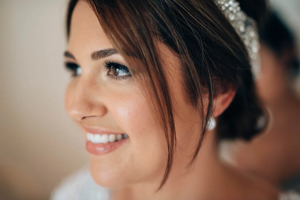 A close-up of refined bridal makeup artistry by Tasleema Nigh. Click to view the full gallery of iconic wedding and milestone event looks.