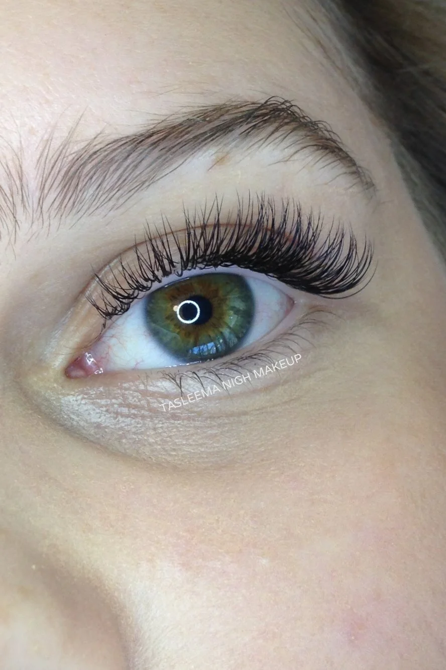 Bespoke Classic Lash Extensions for a refined, "mascara-only" look. This set focuses on perfect isolation and length, providing a subtle enhancement that honors your natural eye shape. Designed by Tasleema Nigh for timeless, everyday elegance.