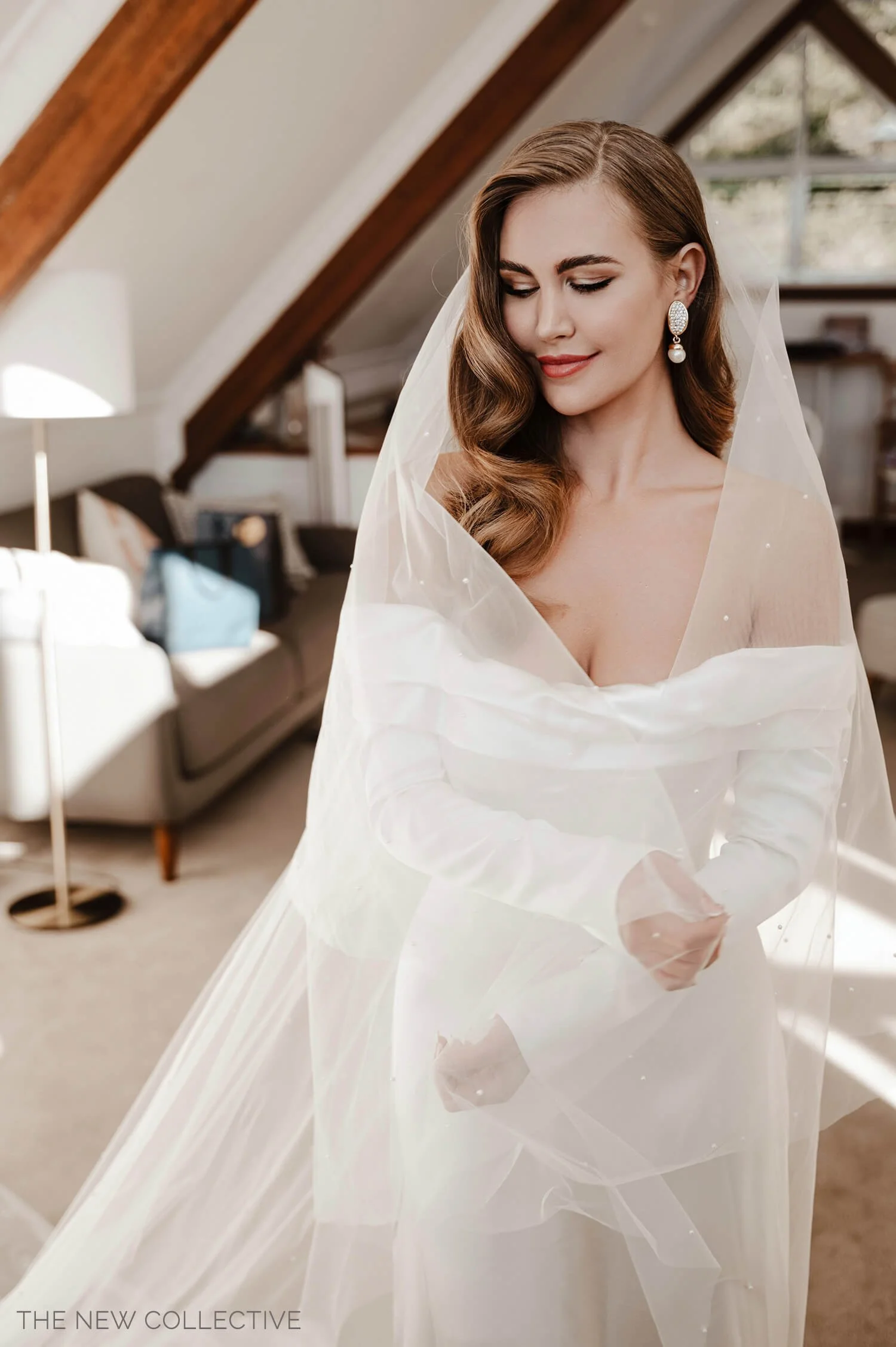 A beautiful bride, Nadia, wearing a veil and showcasing a refined wedding makeup look by Tasleema Nigh. Click to explore bespoke bridal services for Sunshine Coast and Maleny weddings.