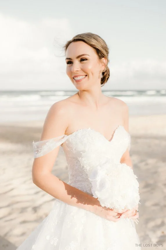 Signature natural bridal makeup by Tasleema Nigh, featuring a luminous, anti-cake finish designed for the Sunshine Coast’s outdoor wedding climate.