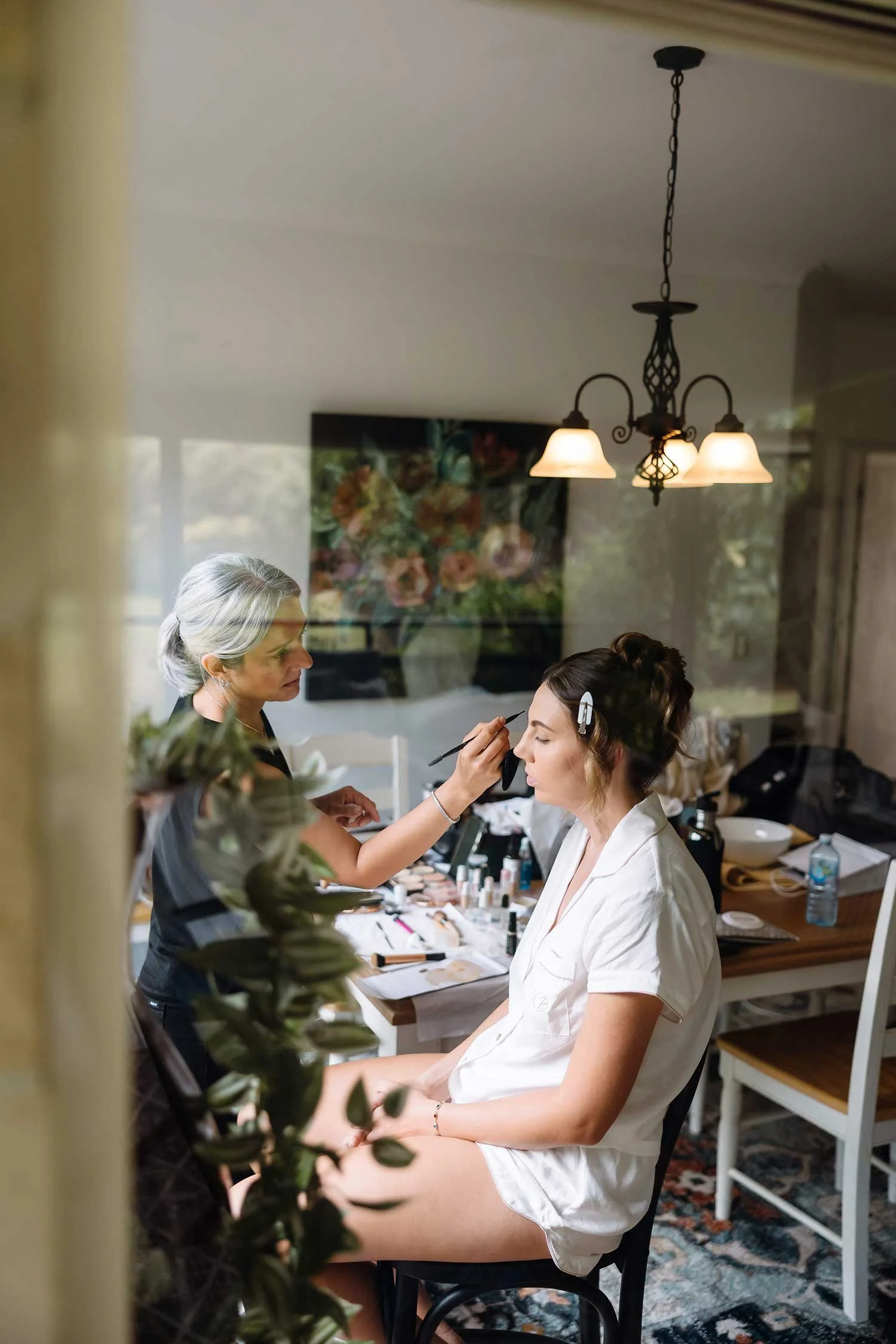 Professional makeup artist and lash specialist Tasleema Nigh working in her private Sunshine Coast Hinterland studio.
