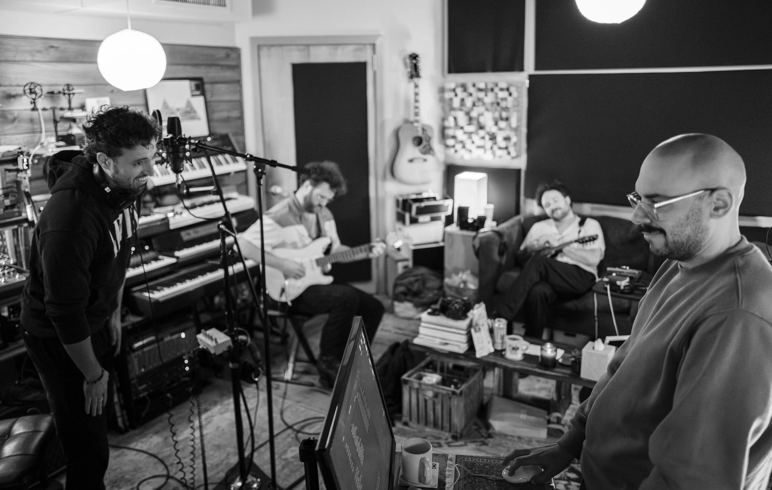 Mark, Joe, Mat, and Chris Sclafani in the studio