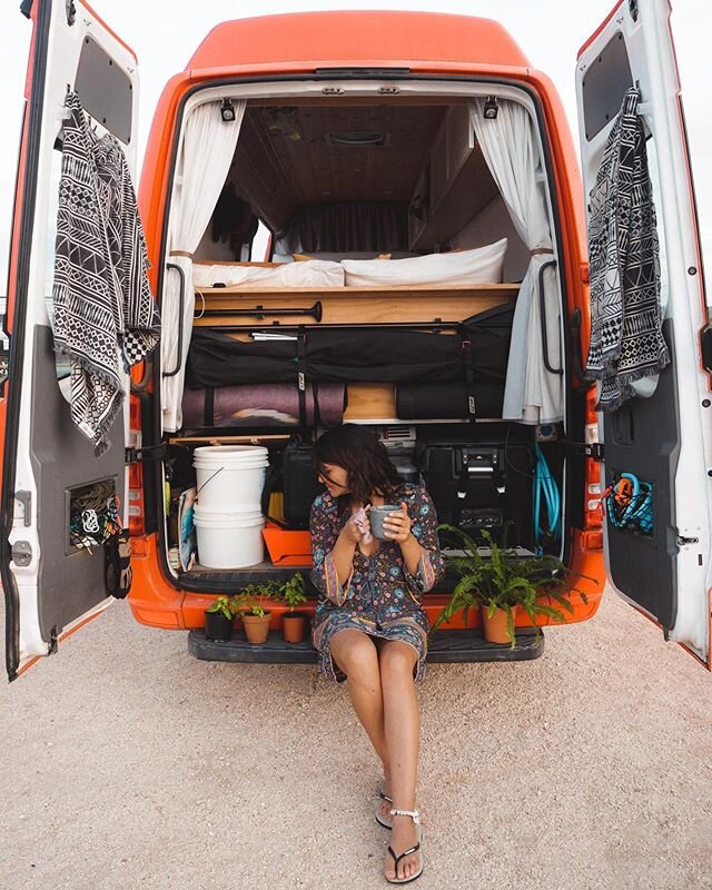 Tea time in the back garden. 🚐☕️🌿⁣
⁣
Just realised that we rarely share snaps of the back end of the van, probably because it&rsquo;s usually a bit of a mess. 😅⁣
So here it is in all its multipurpose glory; Garage, clothes line, storer of many, ma