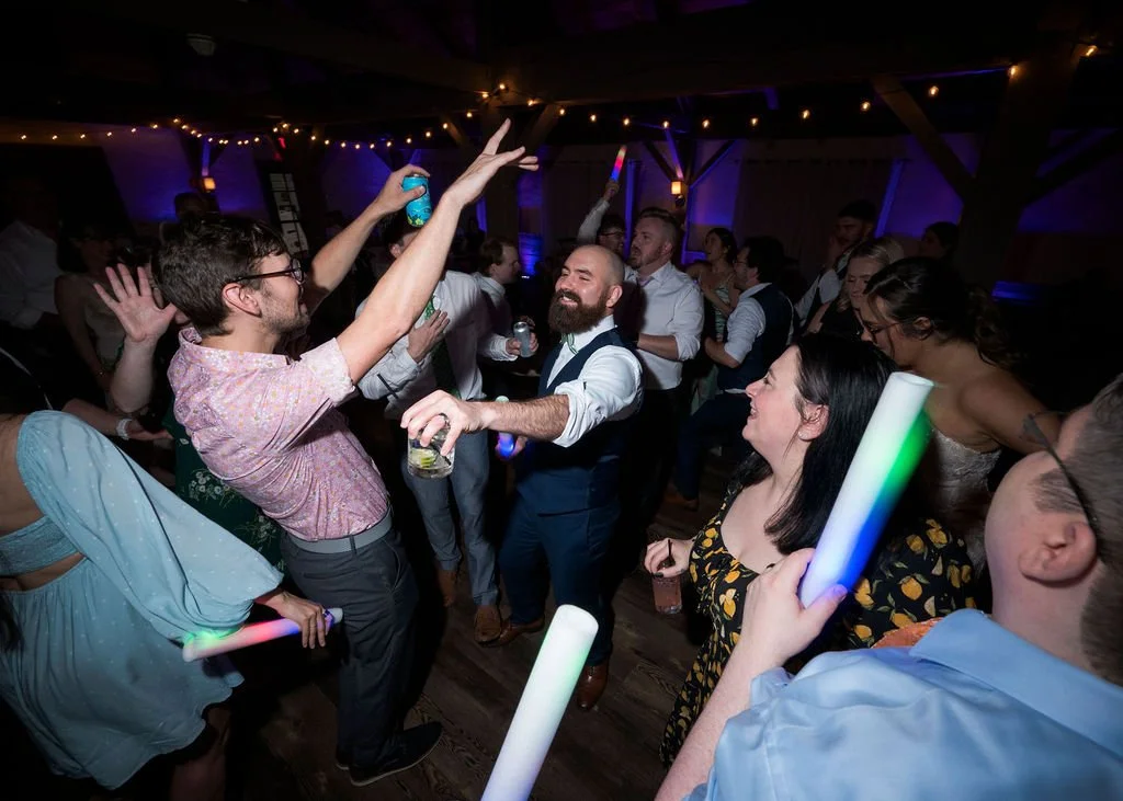 Kelley and guests celebrating together on the dance floor
