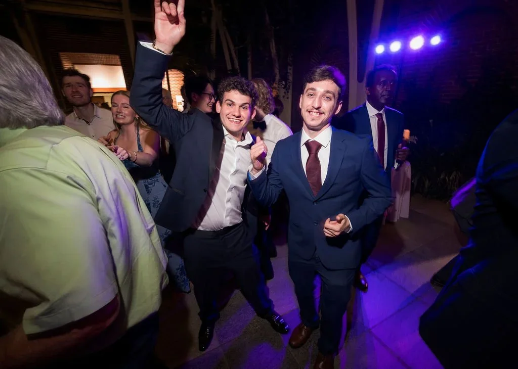 Guests dancing under purple dance floor lighting at New England Botanic Garden at Tower Hill. Photo by Joe Dolen Photography.
