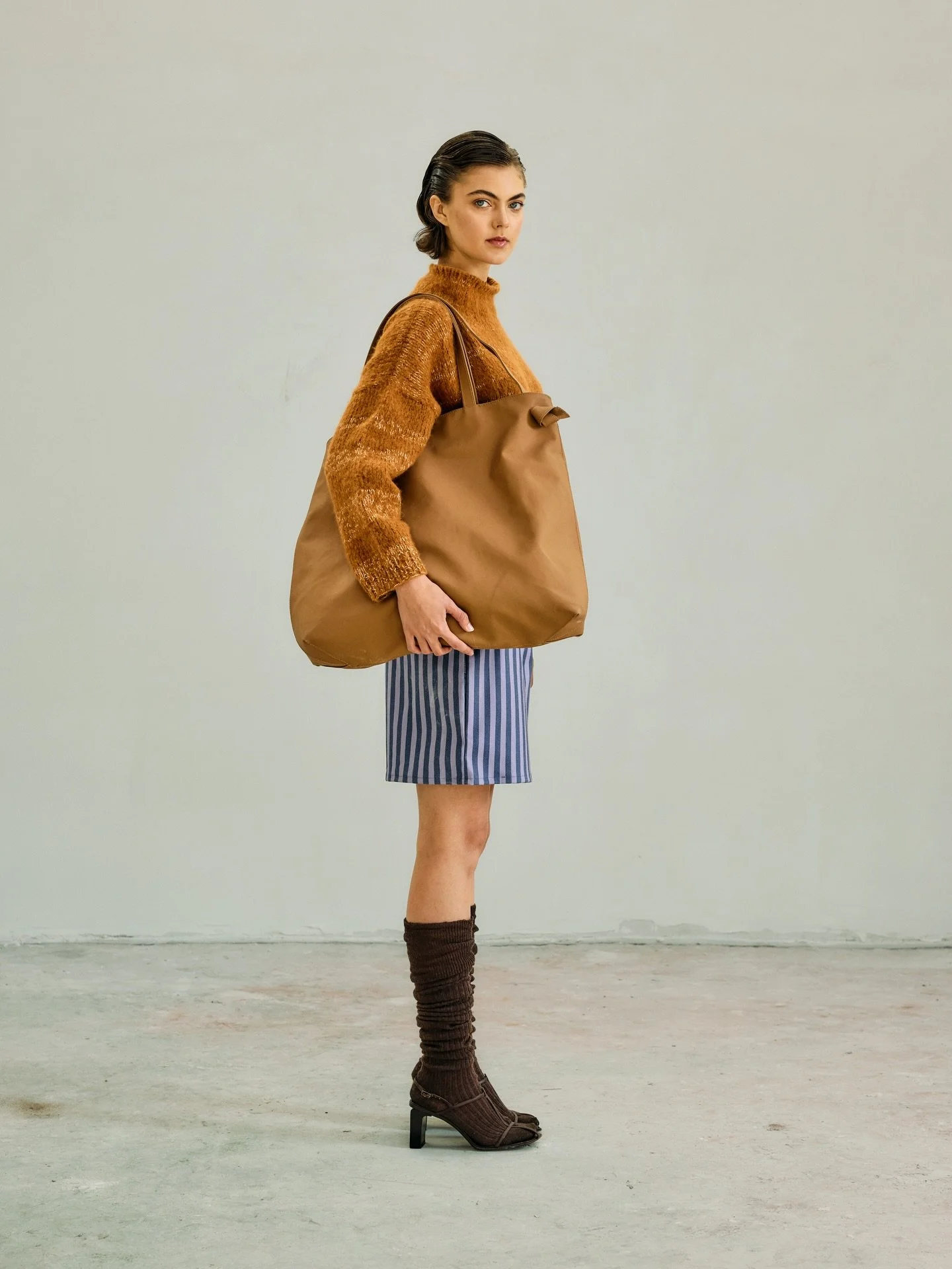 Spring outfits ready? 

Mila shorts&mdash;available in store&mdash;styled with our Travel Bag made of cacao leather, available online. 

La Dama del Cacao capsule is now in store and online.

Photo : @ozel_osman @shotview_management 
Talent: @alisara