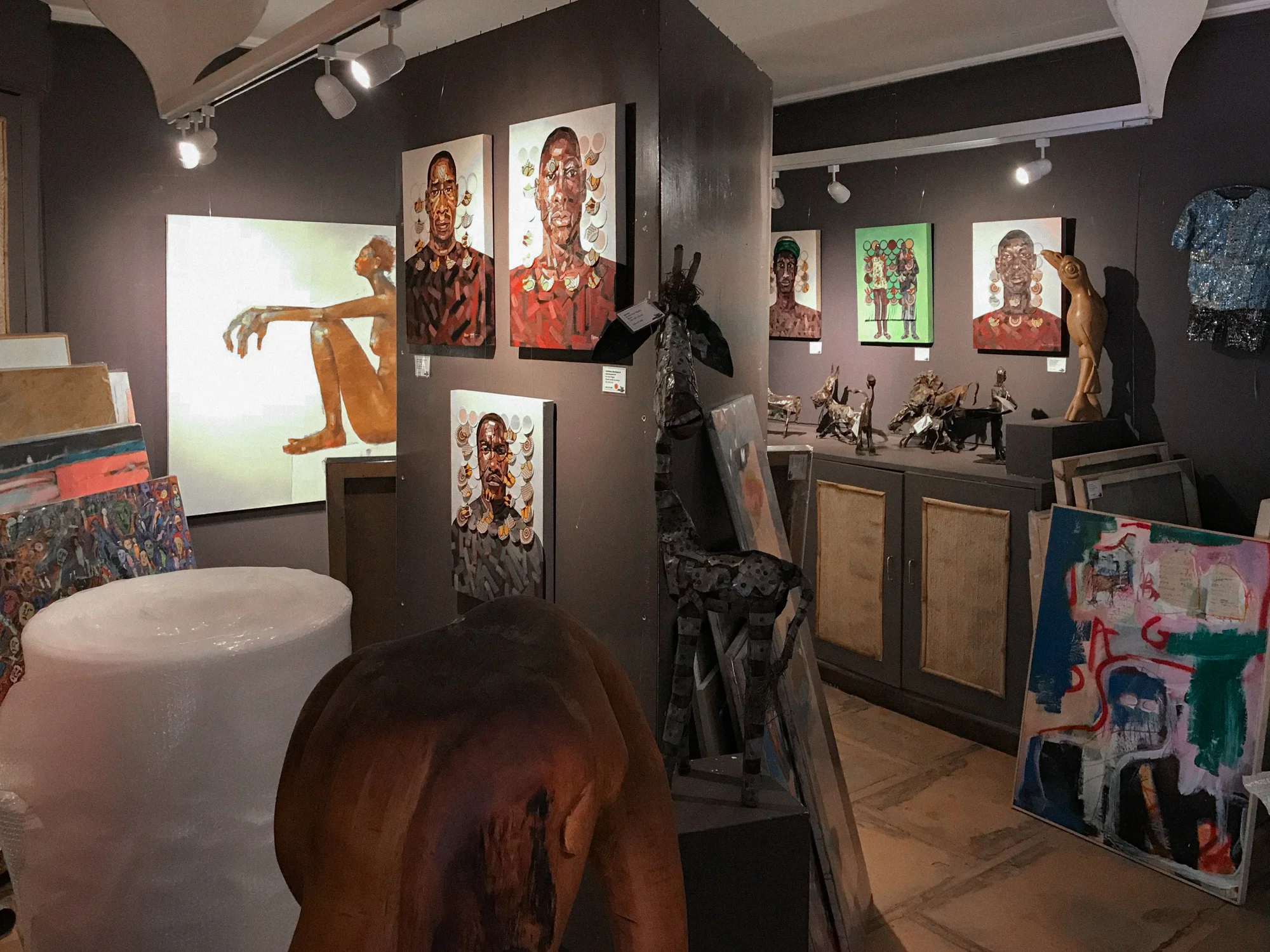 The walls are packed with stunning works - notably Peter Ngugi, Ehoodi Kichapi, and Olivia Pendergast pictured here.
