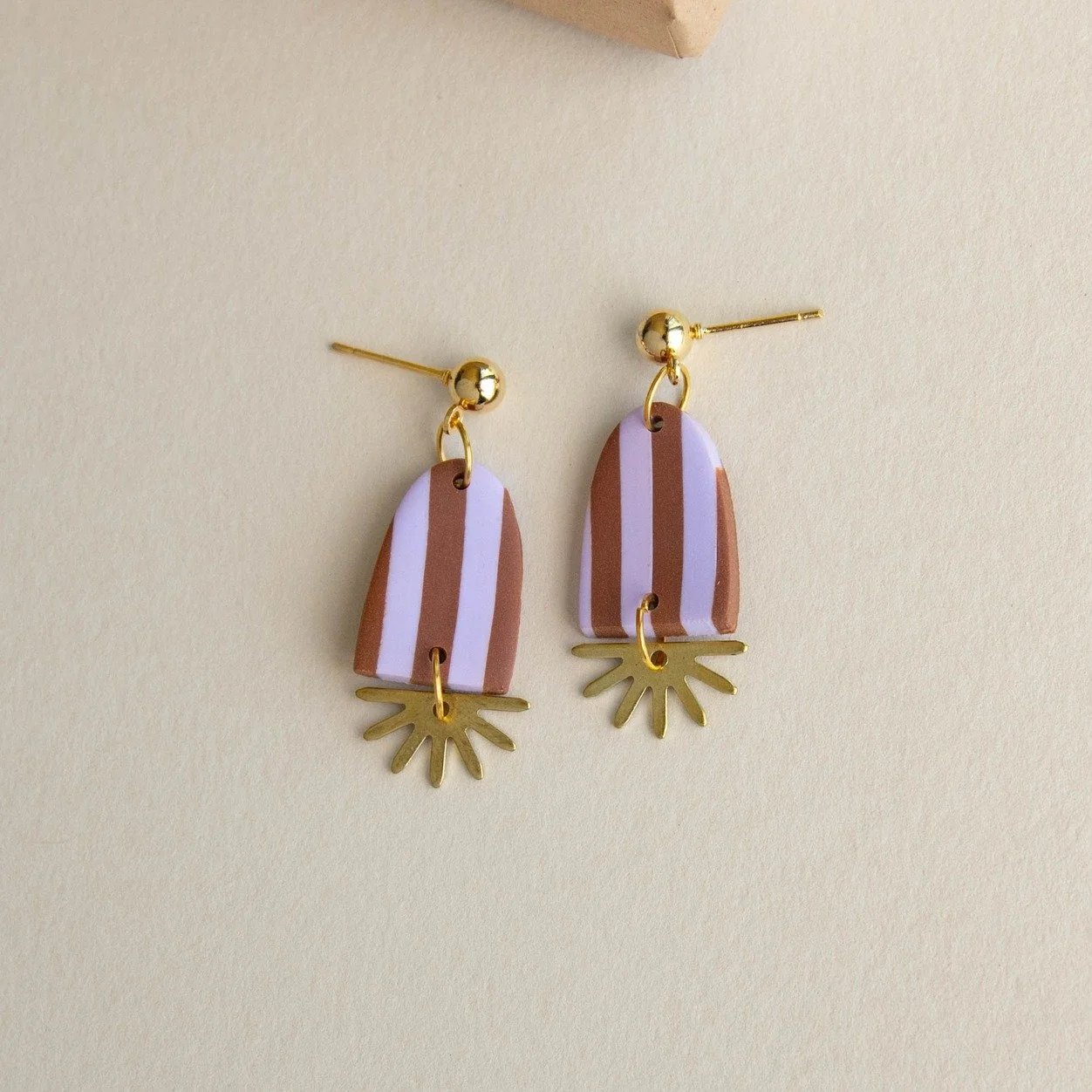 Brighten up your Monday with the Sunny Stripe Drop Earrings, new in from @pepper.you 🌞 

Designed in Brighton using pigmented clay &amp; recycled brass charms, with nickel free earring posts.