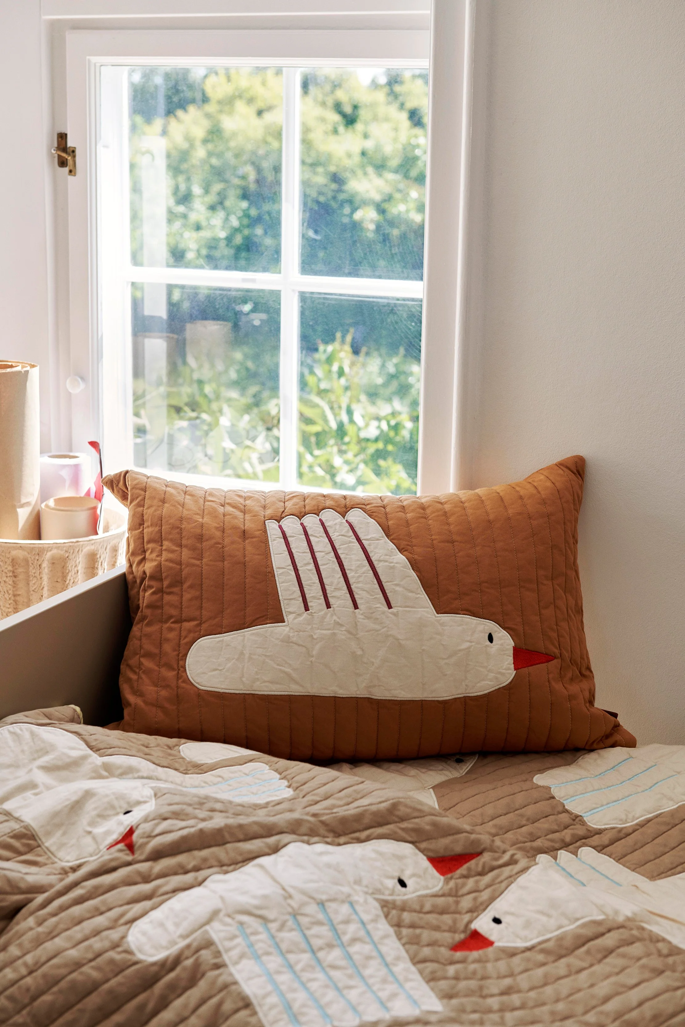 fermLIVING_AW22_BirdQuiltedCushionRectangular_1104266501_image_1.jpg