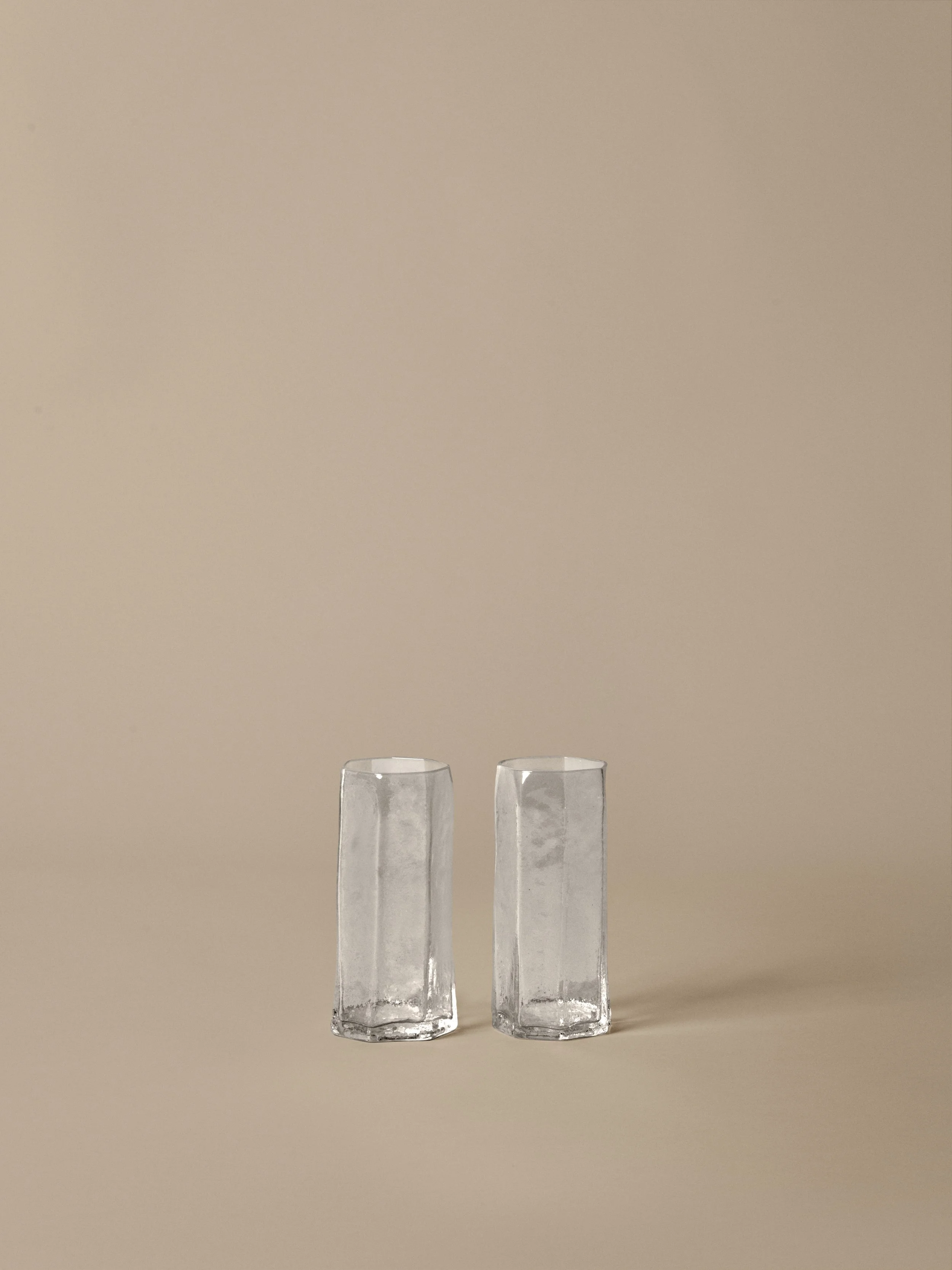 FermLiving_SS26_PackshotsWithBackground_KiruTallGlasses_SetOf2_Clear_1104272987.jpeg