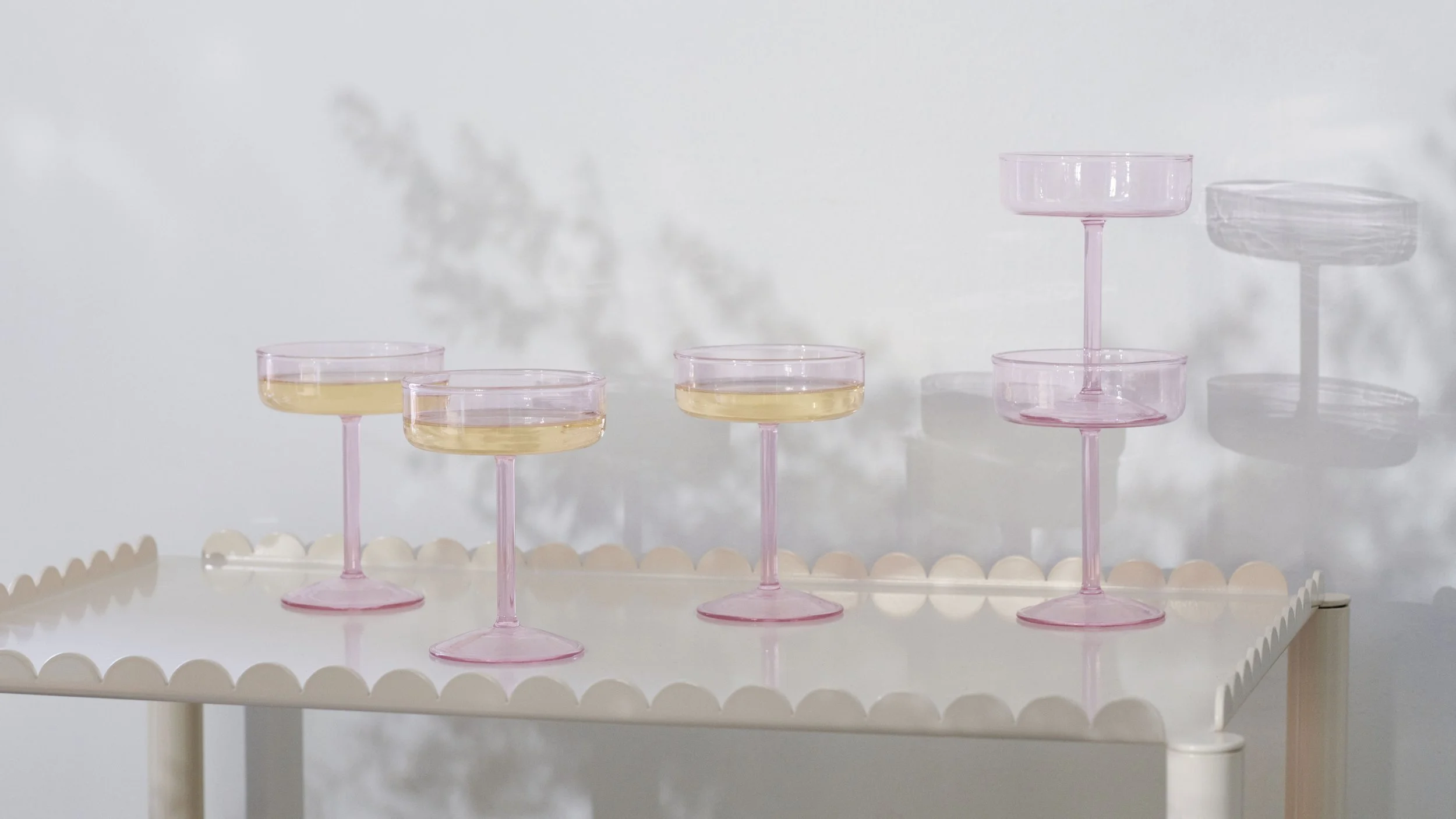 Arcs Trolley High eggshell_Tint Coupe Glass pink.jpg