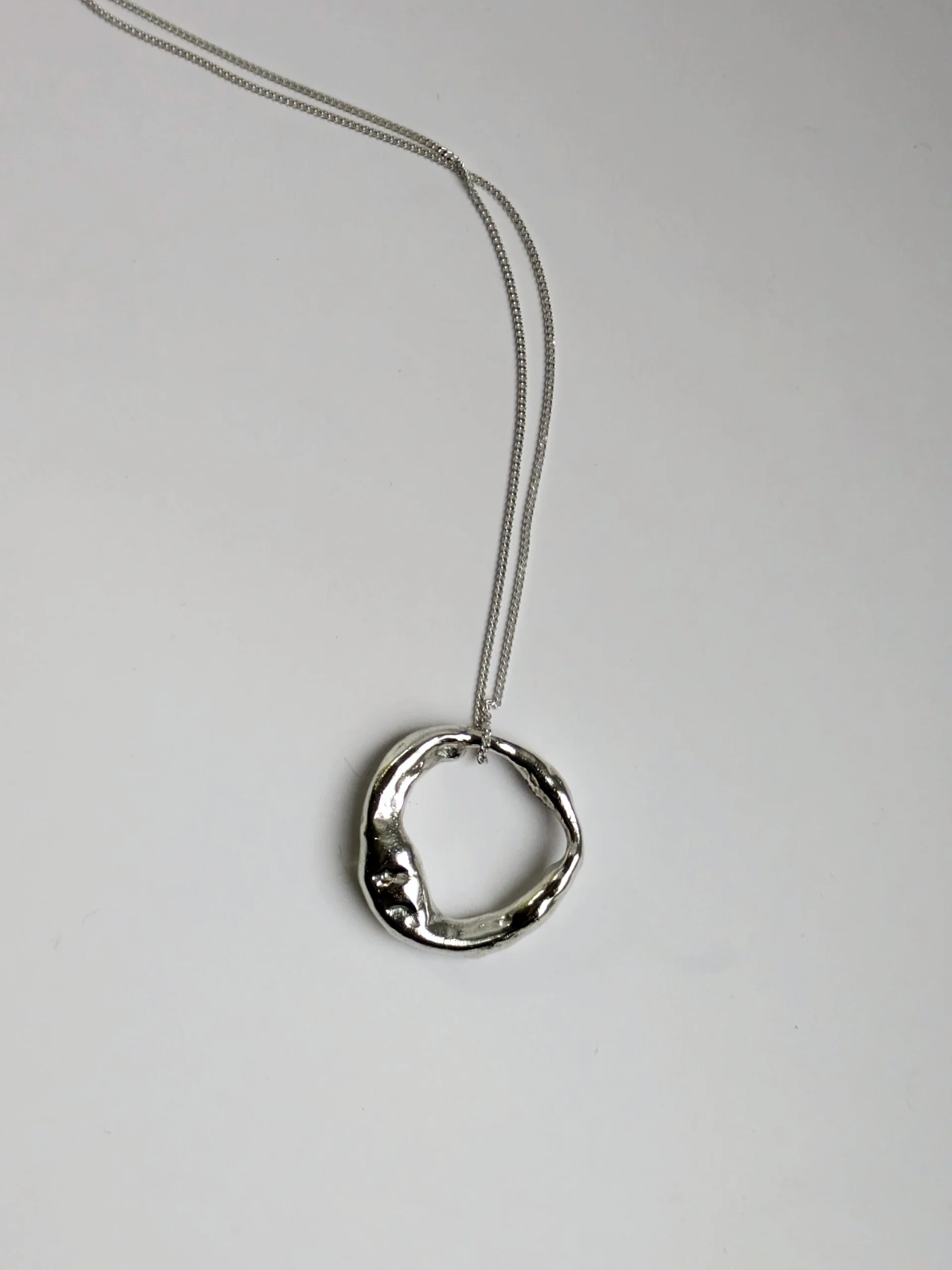 Molten Scrap Silver Pendant - On The Wire