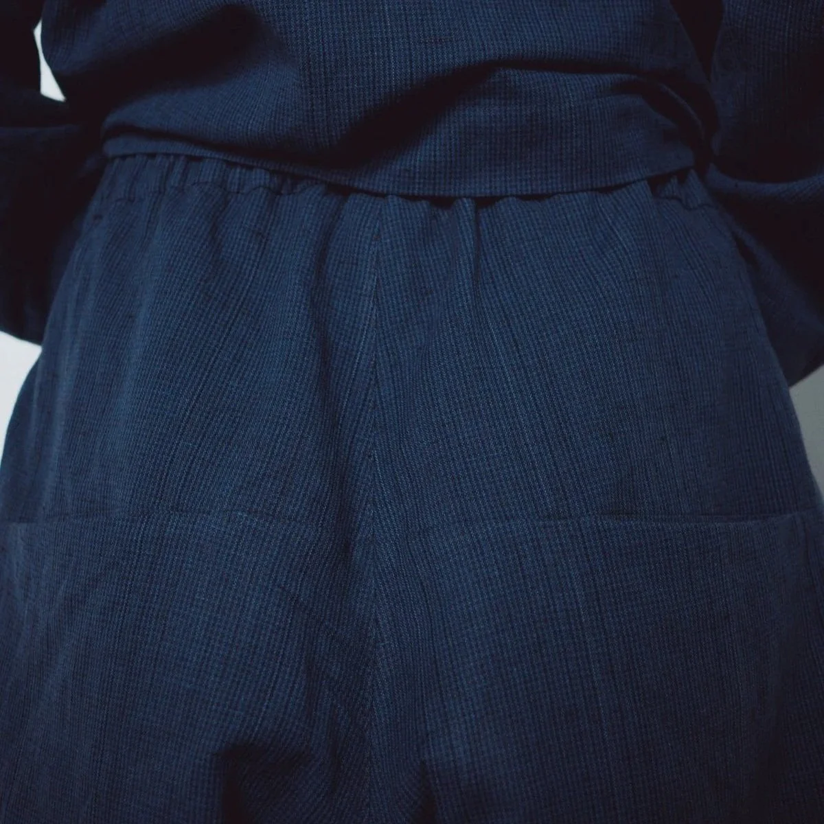 Muku SS26 - Indigo Gingham Patterned Cotton Tapered Trousers with Back Pockets