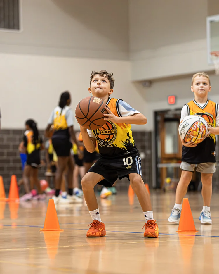 Indoor youth basketball camp environment used by Coach Deon Basketball in The Woodlands