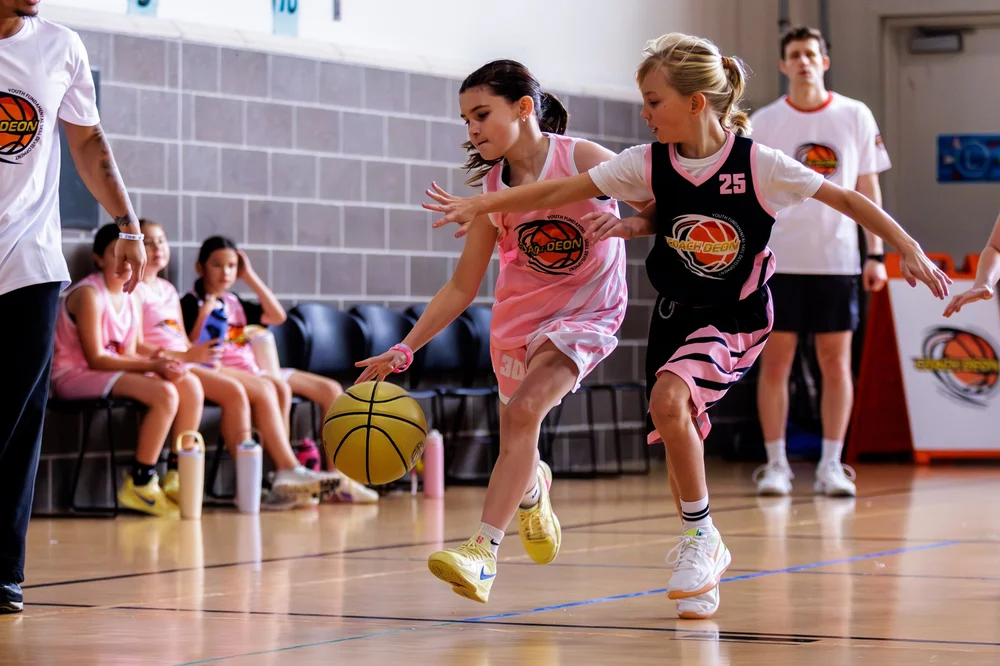 Girls competing in the Coach Deon Basketball Girls Young Ballers League Rising Division