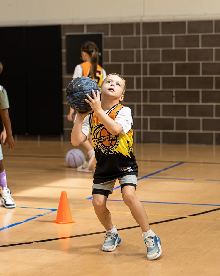 Coach Deon Basketball summer camp players training together in The Woodlands