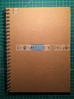 figure 2: a repurposed sketchbook (old label is under the blue)