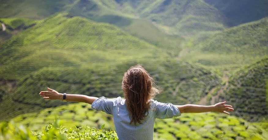 happy woman practicing mindfulness outdoor.jpg