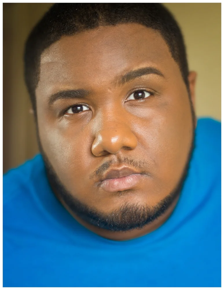 TAHIR C. REGISTER_Headshot.jpg