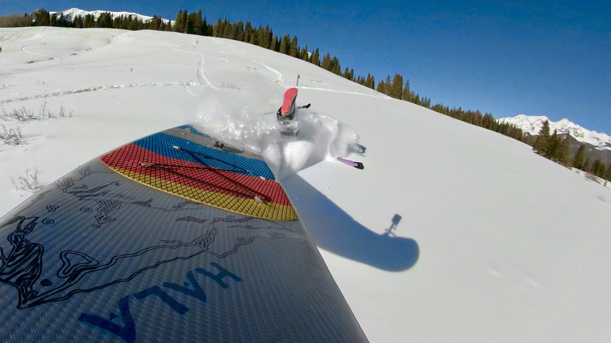 Stand up paddle board snow SUP wipe out in the San Juan Mountains on Lizard Head Pass near Telluride Colorado