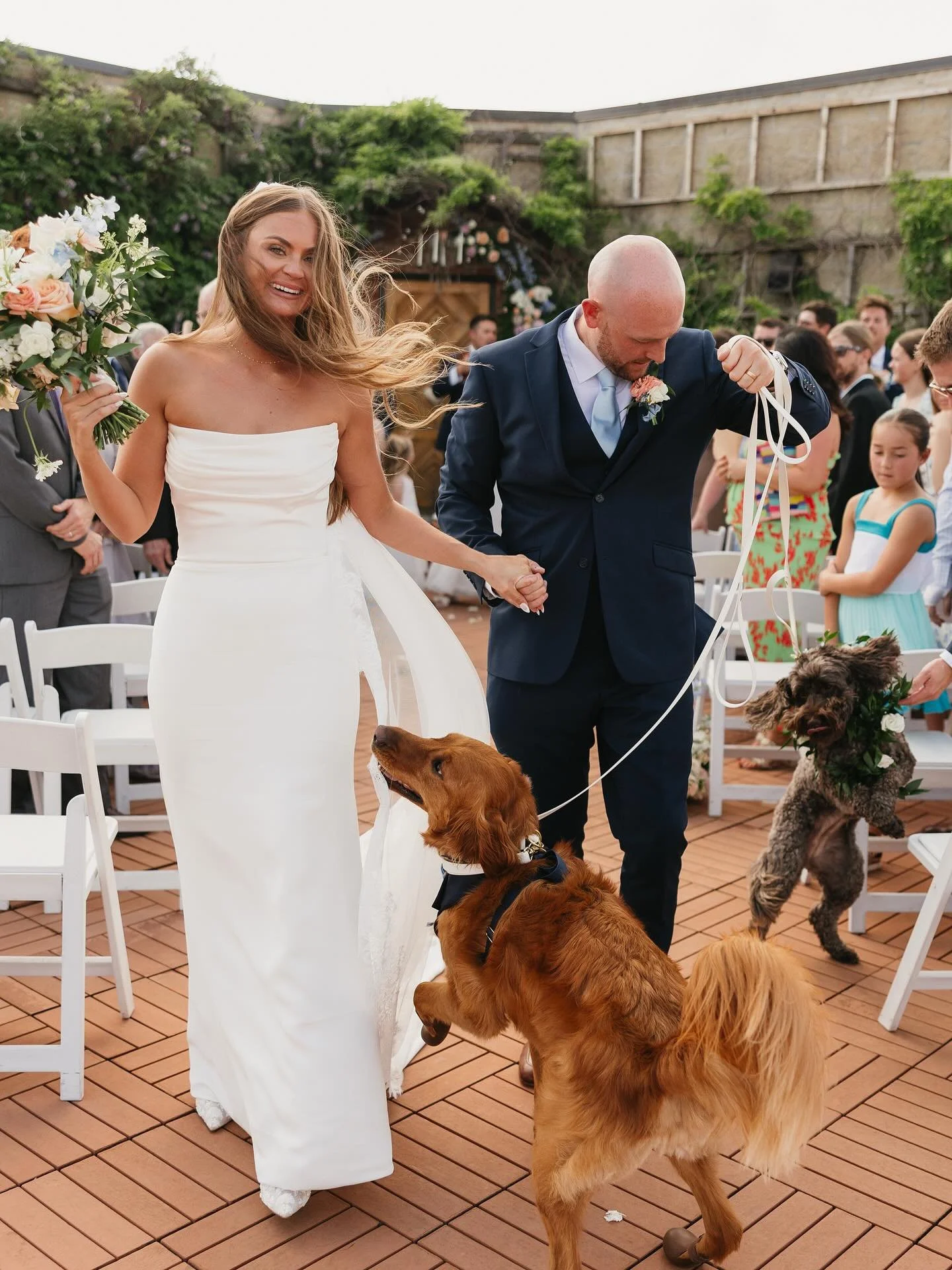 Having their dogs walk them back down the aisle went about as well as you&rsquo;d think it would.