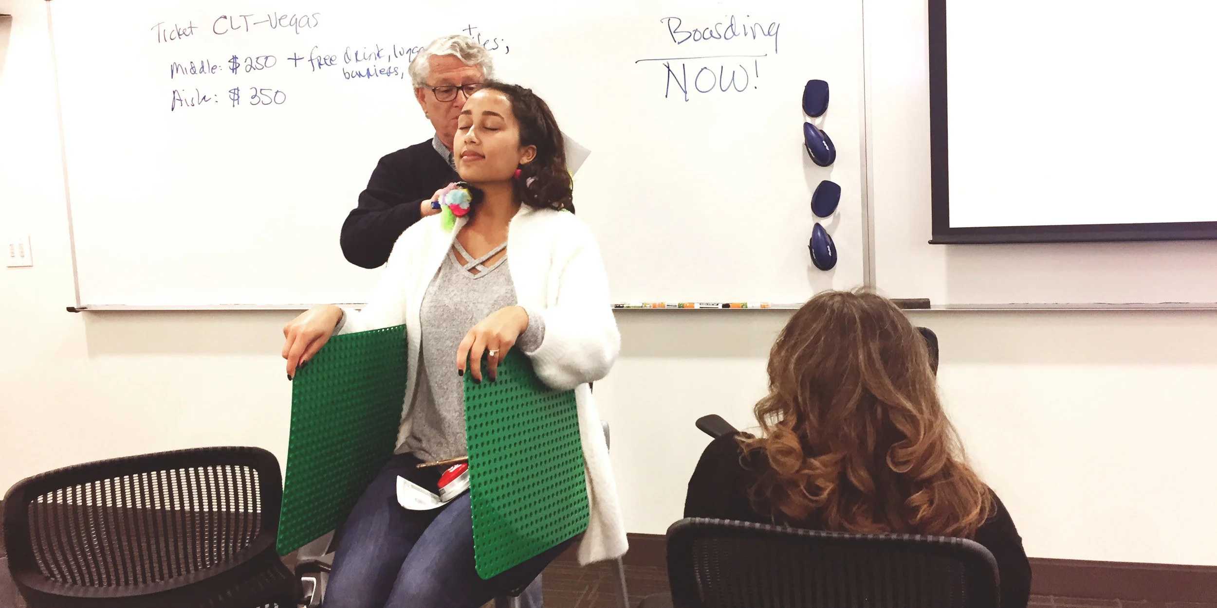 I taught a class of professionals at Wake Forest University's design thinking certificate program to build rapid prototypes. In this example, teams worked together to improve the middle passenger experience on commercial flights.