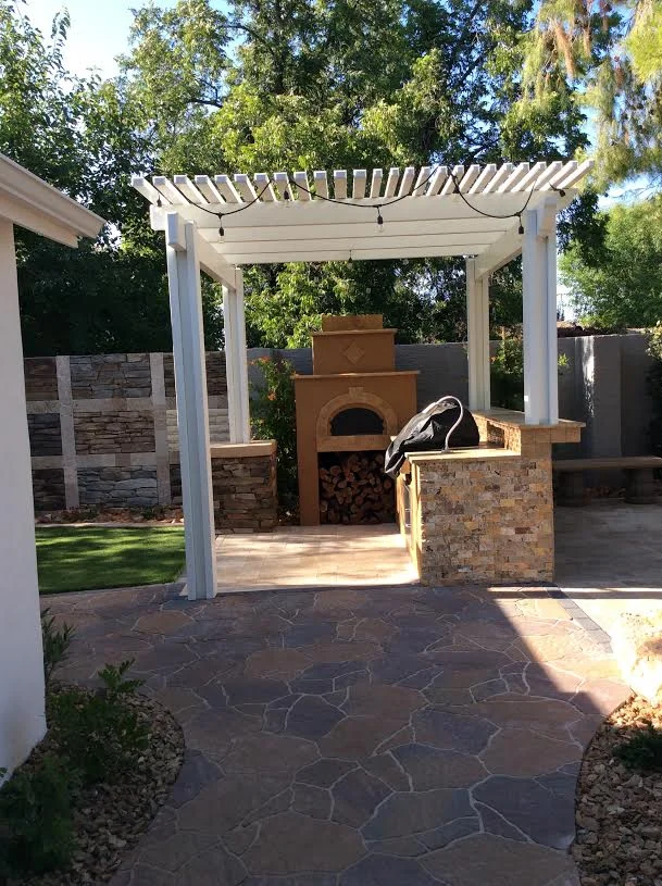 Showroom Pergola, Pavers and BBQ Island with Pizza Oven.jpg