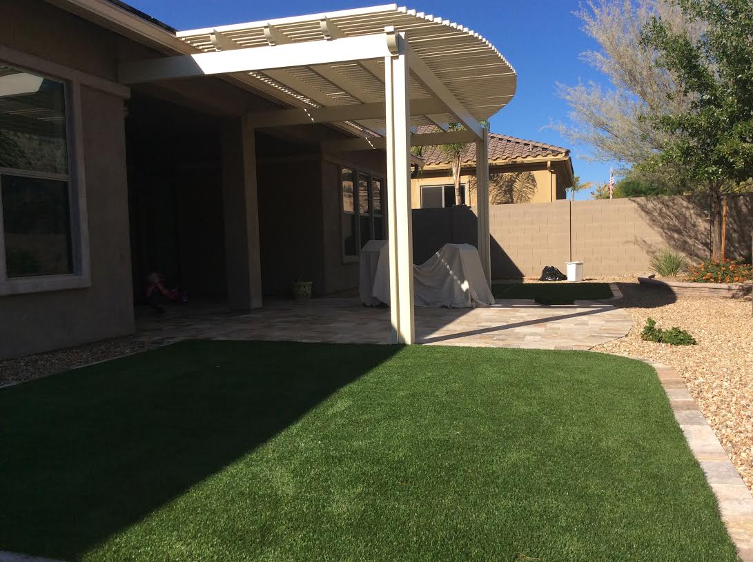 Faux Sod Pergola and Scabos Travertine.jpg