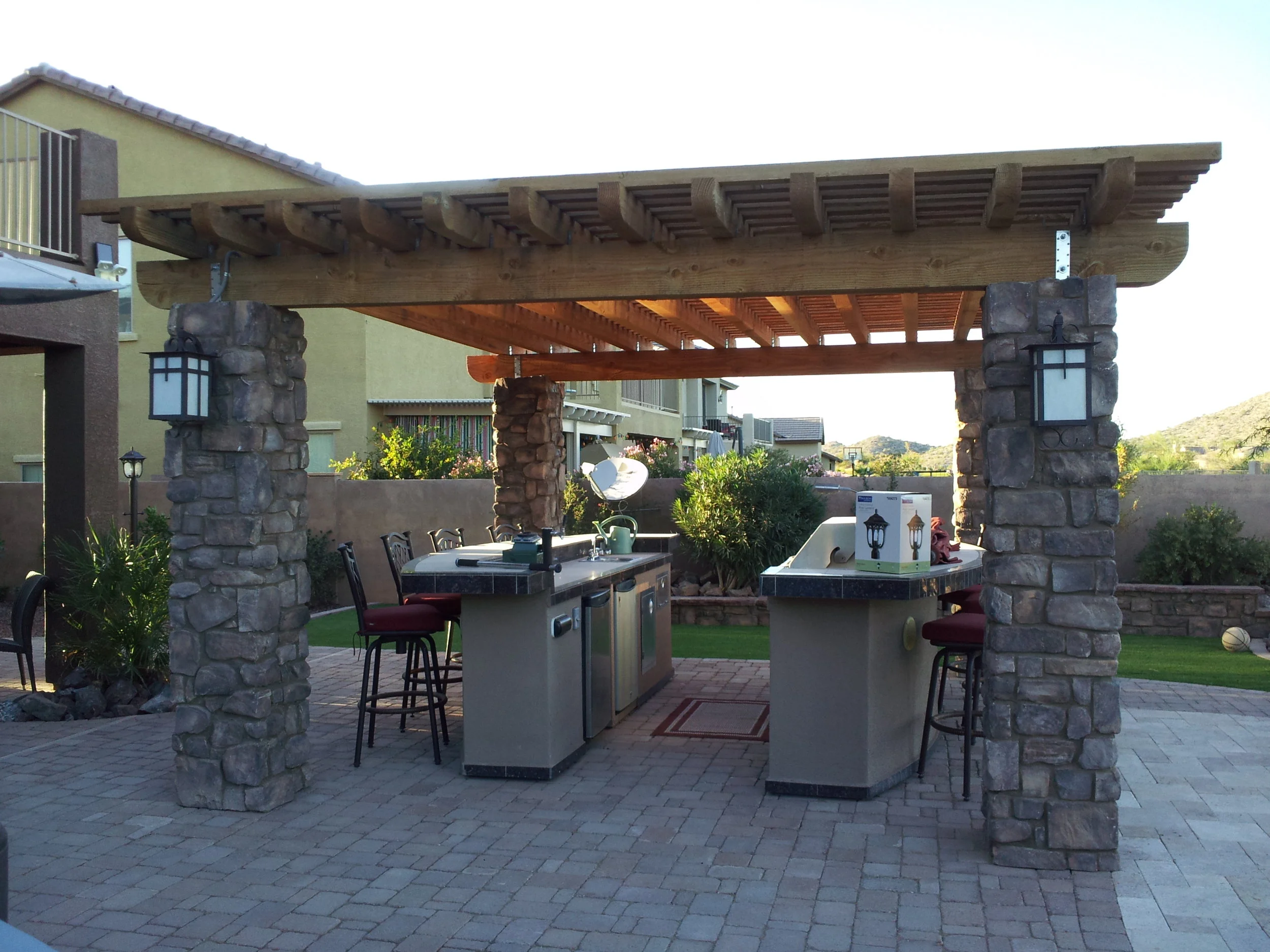 Stack Stone Columns and wood pergola.jpg