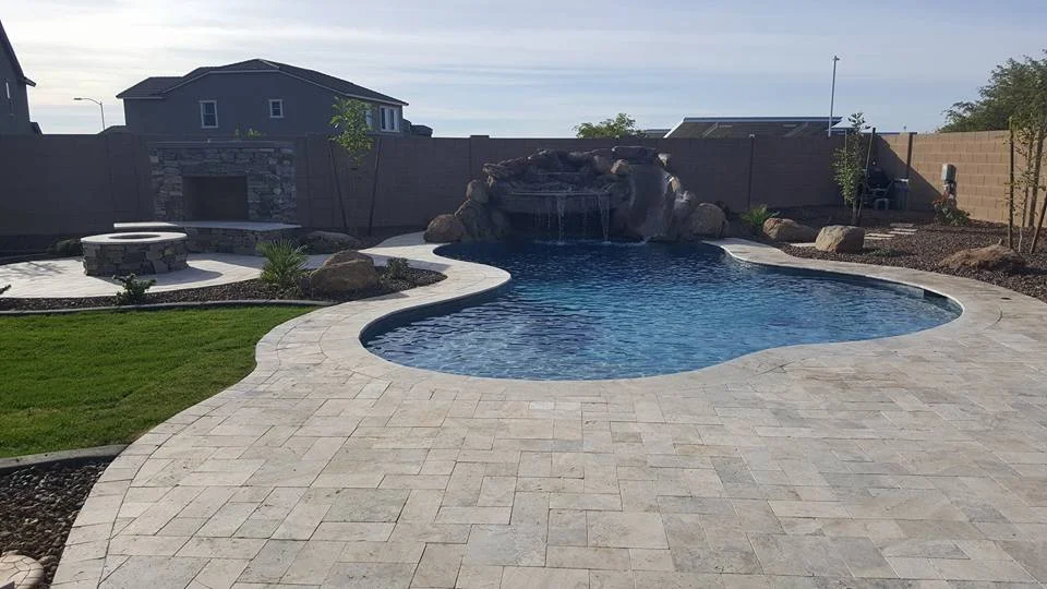 Bradshaw's Silver Travertine pool, grotto and fire features.jpg