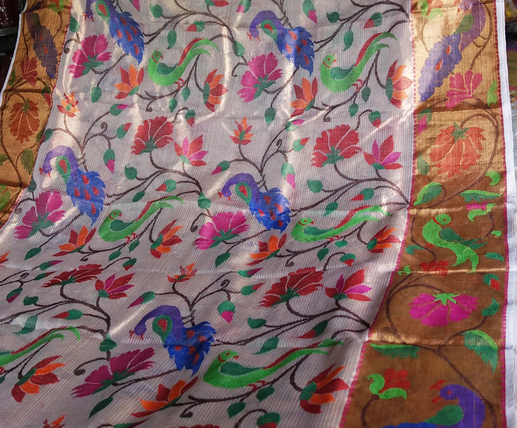 A jacquard all-over patterned sari with a heavy zari border, by Azgarbhai’s workshop