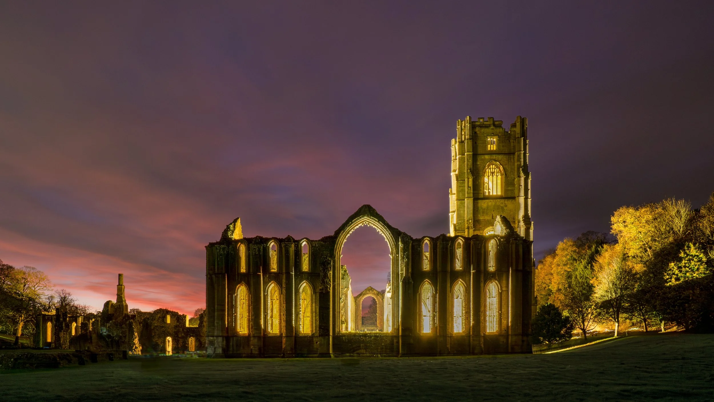 Michelle Bray - Red sky at night...Fountain's delight - Camera and Lens info:  OM 1 with Olympus 12-100 lens, F8 13mm ISO 200 Shutter Speed  60 seconds. The image was taken during an evening visit to Fountains Abbey  in November when it was floodlit