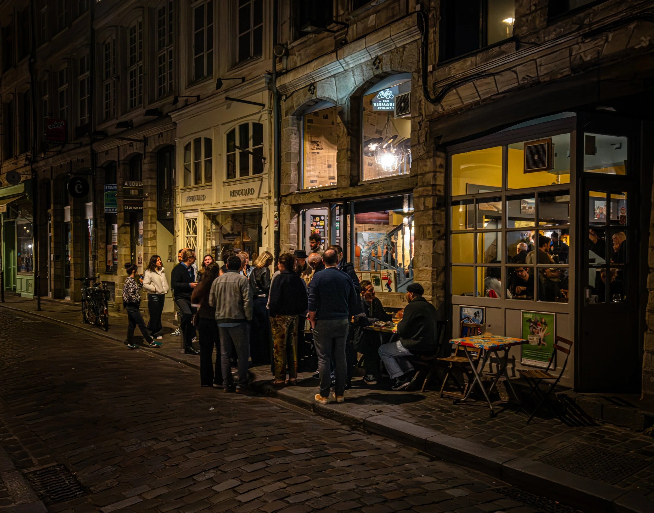 Graeme McGibbon - Venice back streets - I  wanted to try something different from the "classic". The back streets are narrow, with plenty of people, the low light gave a slightly sinister feel. This was taken at f8, 1/10sec, iso10000, -1.7stops at 12