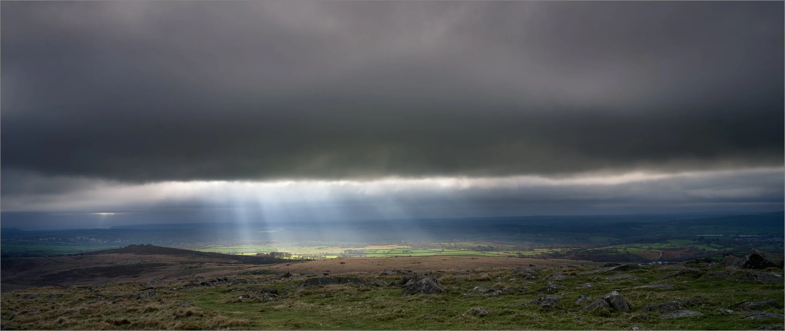 Fintan Healy - God's Rays - Taken from Great Staple Tor, Dartmoor.  Handheld using a Hasselblad X2D 100C - 1/90 second, at f/13 and ISO 100 