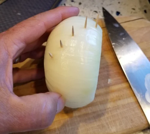 Step 1: After peeling, push a toothpick to the center of the onion every ¼ inch or so, perpendicular core of the onion. This is important, in that it is pretty much impossible to push a toothpick into an onion slice after it has been sliced.&nbsp; S…