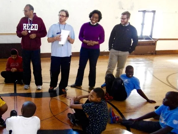 Lee and Barton (right) take a leadership role as liaisons between parish ministry and the sports and recreation program.
