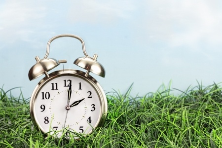 18183911_S_clock_time_grass_spring_forward_daylight_savings.jpg